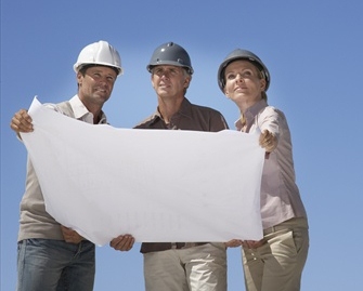 Couple Looking at Floor Plans